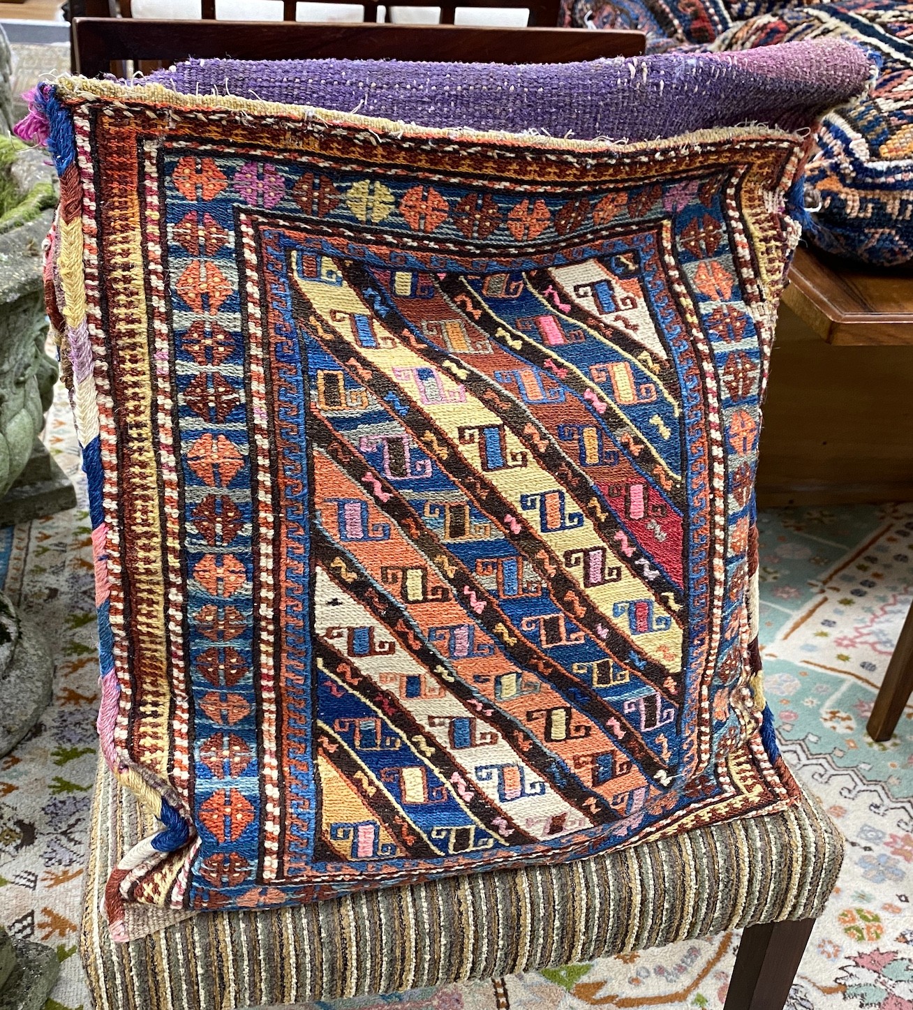 Three Persian salt bags made into cushions